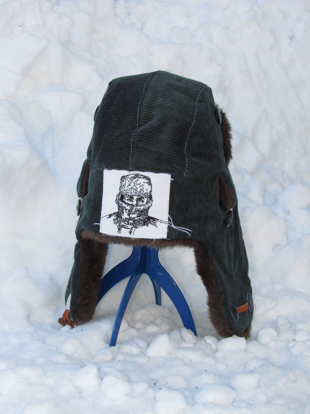 green corduroy scrapper hat